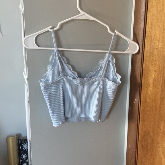 Brand NEW without tags, light blue, stretchy, lace trim around the chest area - Picture 2 of 3